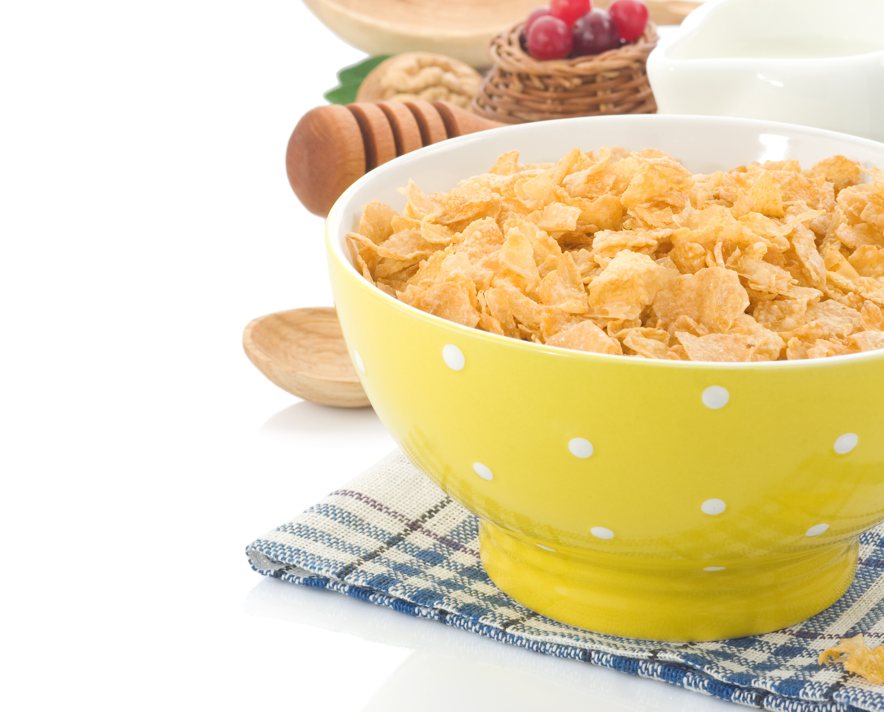 bowl-of-corn-flakes-and-milk-isolated-on-white-PSFHCP7